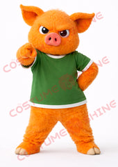 Orange Pig Mascot Costume with Green Shirt Pointing Style